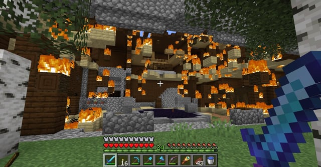 I wandered for three human days to find my first ever Woodland Mansion. It was already on fire.